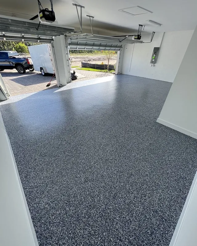 3-car garage with decorative flake epoxy floor coating