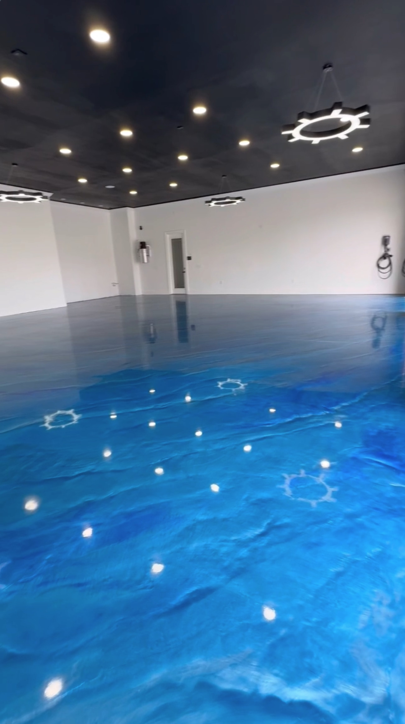 Blue metallic epoxy showroom floor in Lake Nona