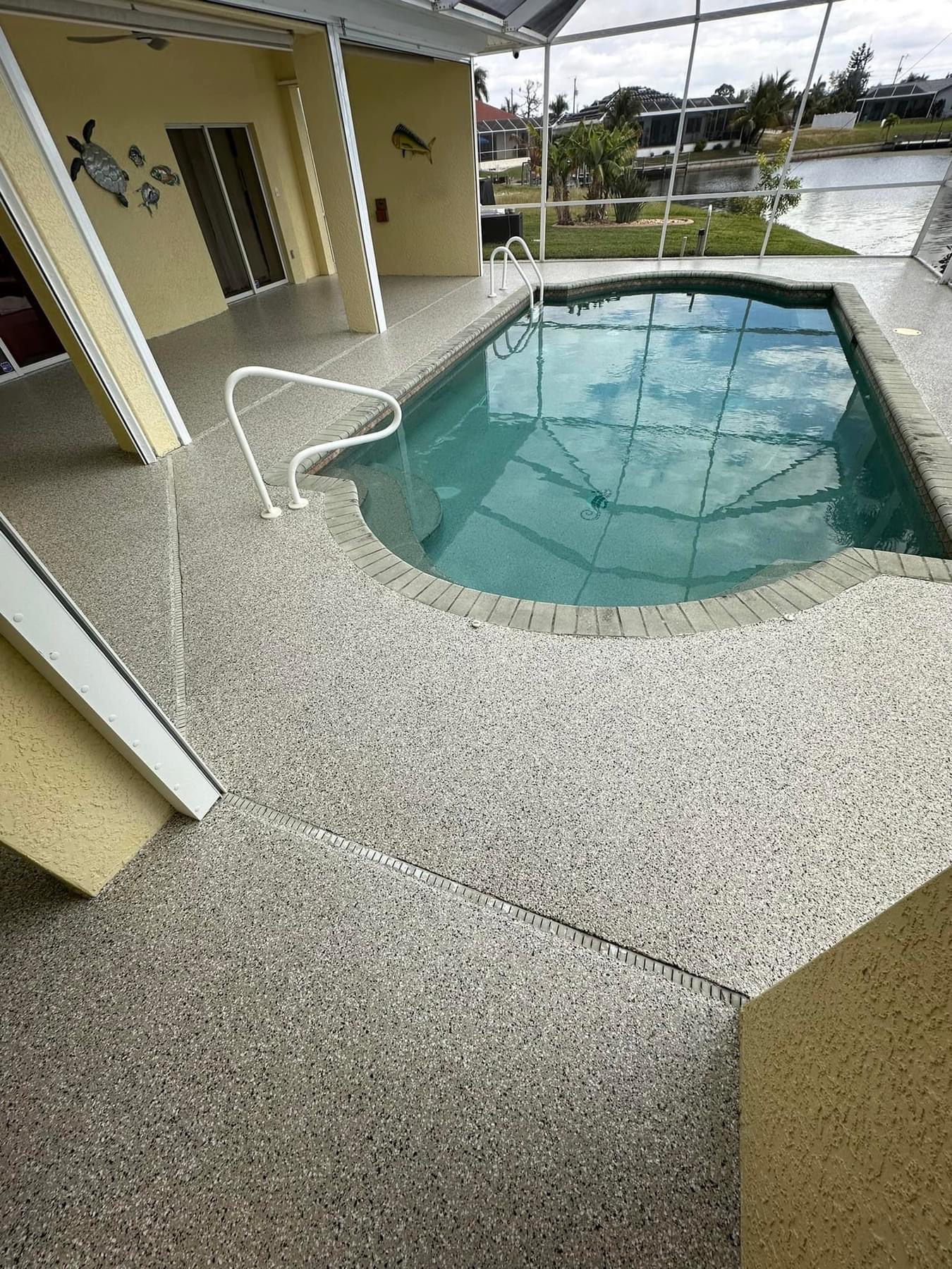 Pool deck after coating - decorative flake finish
