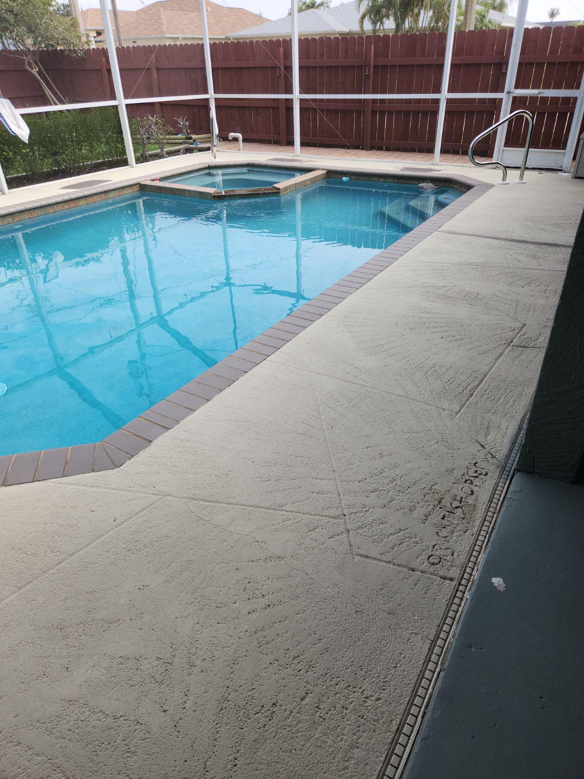 Pool deck before coating - worn concrete